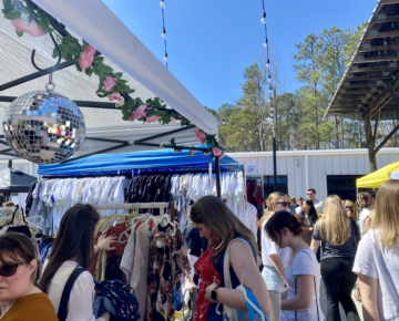 Shoppers of all ages explore the eclectic collections at The Cary Vintage Market.